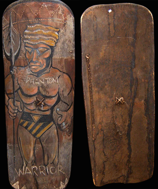 Illustration for article titled Why Does This Comic Book Hero Appear On So Many New Guinea War Shields?